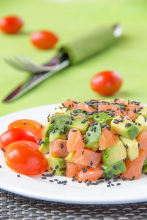 Salad with avocado and red fish の写真素材