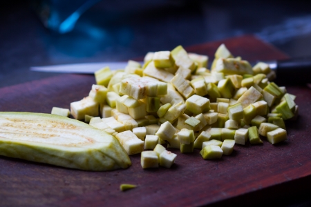 Diced eggplant on a cutting board, cooking dishの写真素材