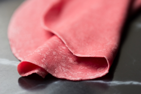 Thinly rolled pink dough for pasta with beet juiceの写真素材