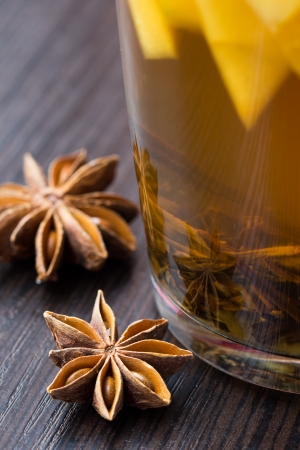 Star anise on table about tea in mugの写真素材