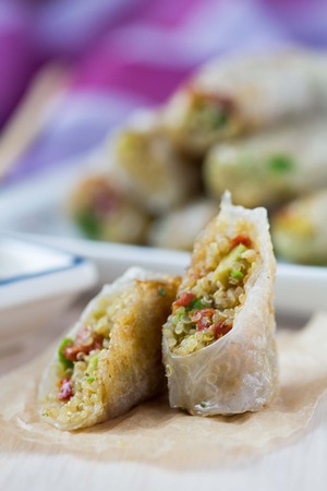 Asian spring rolls stuffed with quinoa, vegetables, crisp, tasty dishの写真素材