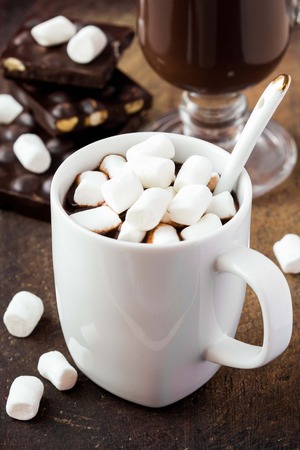 Drink hot chocolate with marshmallows in white cupの写真素材