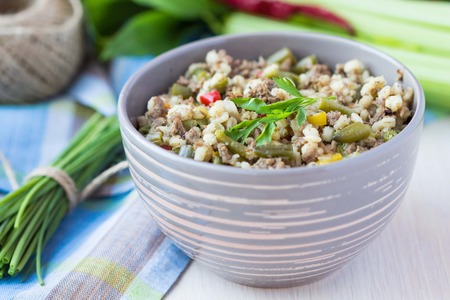 Stew with pearl barley, vegetables, minced meat, herbs, homemade delicious dinnerの写真素材