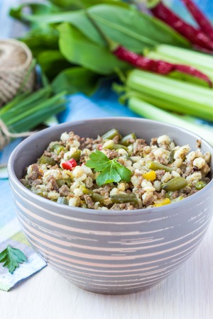 Stew with pearl barley, vegetables, minced meat, herbs, homemade delicious dinnerの写真素材