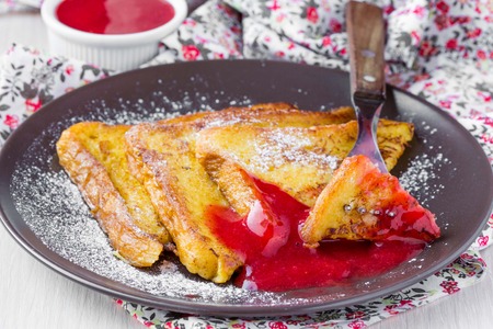 French toast with strawberry sauce, rustic breakfast, delicious dessertの写真素材