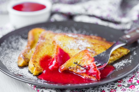 French toast with strawberry sauce, rustic breakfast, delicious dessertの写真素材