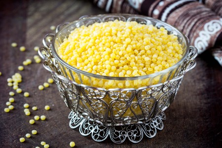 Israeli couscous ptitim, unprepared, dry, healthy cereals, tasty diet ingredientの写真素材