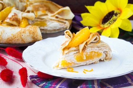 Pancake cake with oranges, whipped cream, delicious breakfast on Shrove Tuesdayの写真素材