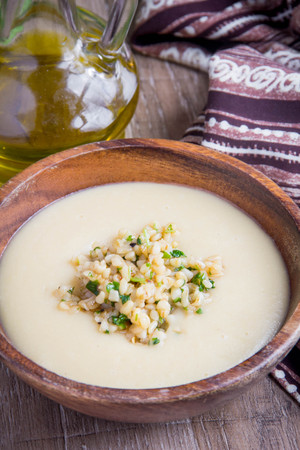 White cream soup with vegetables, mushrooms, rice, bulgur, delicious light first courseの写真素材