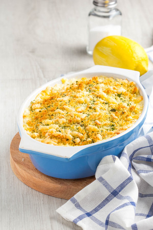 Casserole with crispy crumble, potato gratin, baked meat butter cheese dish, delicious homemade dinnerの写真素材