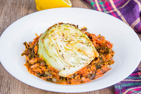 Young baked cabbage with vegetable stew, healthy dish tasty traditional Russian rusticの写真素材