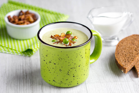 Cream soup of green peas, broccoli, spinach with crispy onion fries in Ñup, tasty foodの写真素材