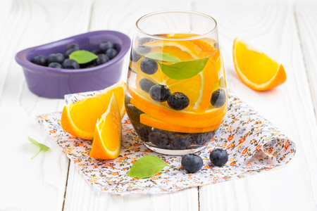 Water with orange and blueberry, tasty summer healthy soft drinkの写真素材