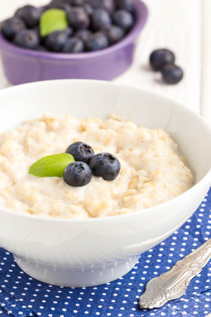 Oatmeal porridge with blueberries, delicious and healthy breakfastの写真素材