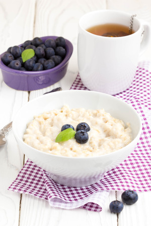 Oatmeal porridge with blueberries, delicious and healthy breakfastの写真素材