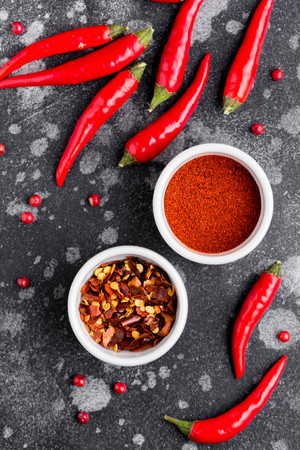 Whole chili pepper, flakes, powder, hot spicy seasoning for dishesの写真素材