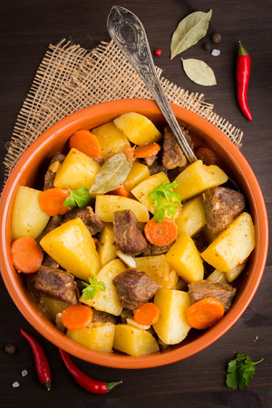 Beef stew with vegetables potatoes, carrots, delicious autumn dish, gravy sauceの写真素材