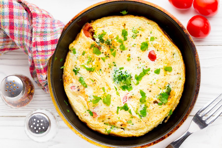 Omelet with broccoli and tomato, delicious healthy Breakfast, traditional morning food for childrenの写真素材