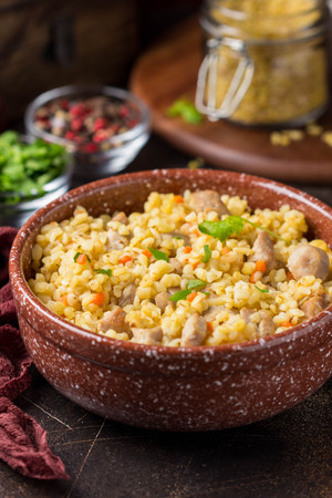 Bulgur with turkey, pork or beef. Eastern dish of rice, delicious traditional food.の写真素材