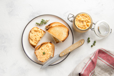 Chicken pate with carrots on toast bread, delicious spread for Breakfast. Healthy food, vegetable snack, wine aperitizerの写真素材