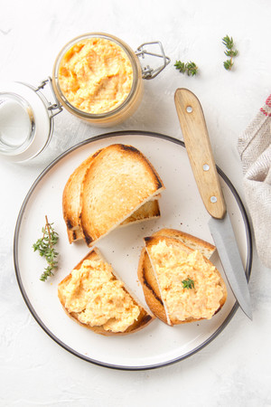 Chicken pate with carrots on toast bread, delicious spread for Breakfast. Healthy food, vegetable snack, wine aperitizerの写真素材