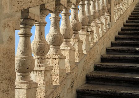 Ancient Roman staircase. White marble and blue sky