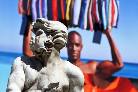 Moro Fountain Piazza Navona in Rome. Detail of the bust, on the huge background of contrasting billboards.の写真素材