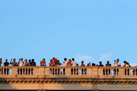Pincio terrace in Rome seen from below at sunset. Many people admire the view.の写真素材