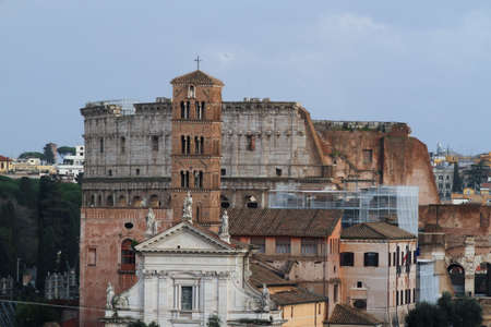 View of Rome, Basilica of Santa Maria in Cosmedin in the foreground and the Colosseum in the...