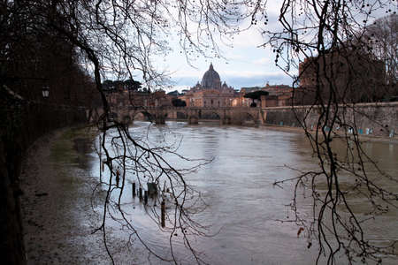 Dome of St. Peter in Rome and Castel Sant'Angelo Bridge, seen from the Tiber river.の写真素材