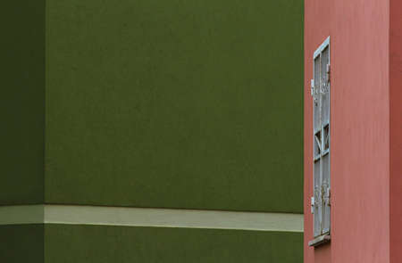 Facades of urban buildings, in evidence the pastel colors of the plaster and the geometric lines of the buildings.の写真素材