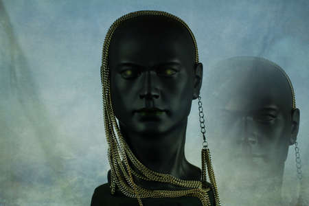 3d Illustration. Black plastic mannequin head with golden necklace and in the background image cloning on light mottled backgroundの写真素材