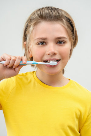 SchoolBoy Brush Teeth Child Looking At Camera Over White Background , Dentistry, Stomatology, Dental...