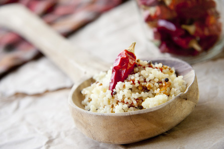 Couscous on wooden backgroundの写真素材