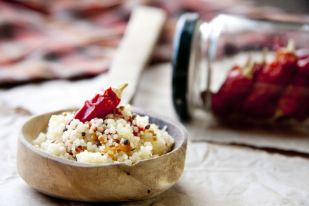 Couscous  on wooden backgroundの写真素材