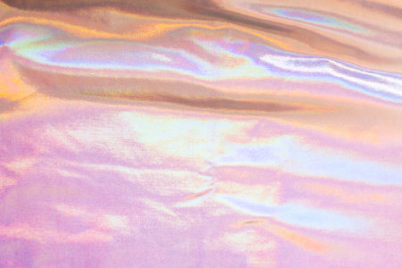 abstract background of colored crumpled fabric with some folds in itの写真素材