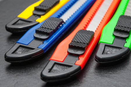 Four colored cuttersの写真素材