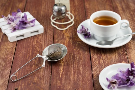 composition of tea and dried leaves of orchidsの写真素材