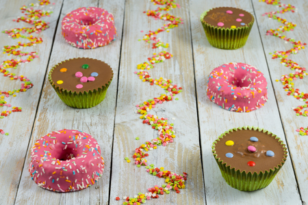 Composition made with muffins, donuts and sugar starsの写真素材