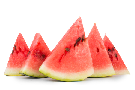 Triangular pieces of watermelon with seeds .On white isolated fone.の写真素材