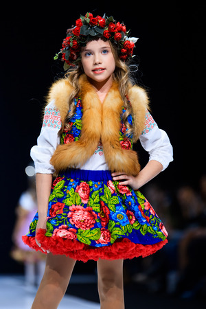 MOSCOW, RUSSIA - OCTOBER 19, 2016: Model walk runway for WORLD RUSSIAN BEAUTY catwalk at Spring-summer 2017 Moscow Fashion Week. Clothes in national ethnic style.のeditorial素材