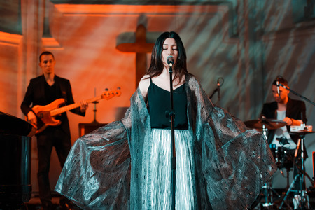 MOSCOW, RUSSIA - JANUARY 27, 2017: R&B soul band GAYANA performing live at the St. Andrews Anglican Church on January 27, 2017 in Moscow, Russia. Acoustic perfomance with the string quartet, piano and the great scenic light.のeditorial素材