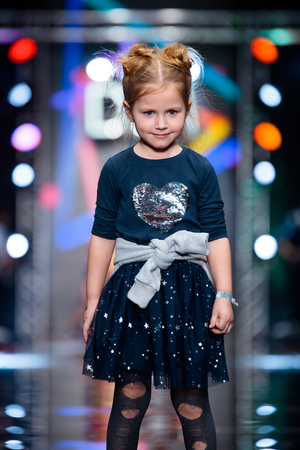 MOSCOW, RUSSIA - MARCH 12, 2017: Model walk runway for DETSKY MIR catwalk at Fall-Winter 2017-2018 at Mercedes-Benz Fashion Week Russia. Kid's fashion.のeditorial素材