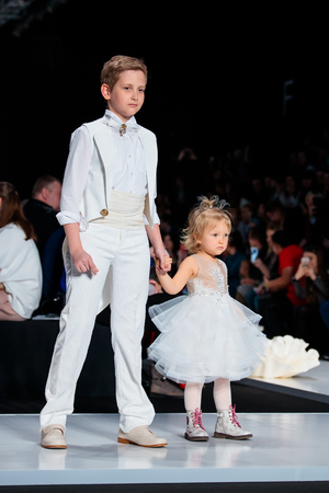 MOSCOW, RUSSIA - MARCH 12, 2017: Model walk runway for KIBOVSKAYA & PABLOSKY catwalk at Fall-Winter 2017-2018 at Mercedes-Benz Fashion Week Russia. Kid's fashion.のeditorial素材