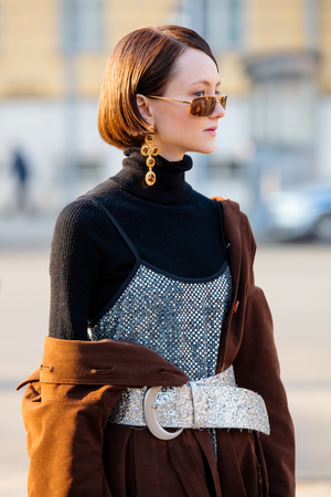 MOSCOW, RUSSIA - MARCH 14, 2017: People demonstrating street style fashion near Moscow Manege at Mercedes-Benz Fashion Week Russia.のeditorial素材