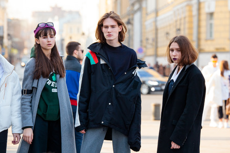MOSCOW, RUSSIA - MARCH 14, 2017: People demonstrating street style fashion near Moscow Manege at Mercedes-Benz Fashion Week Russia.のeditorial素材