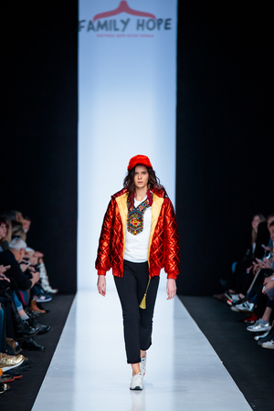 MOSCOW, RUSSIA - MARCH 15, 2017: Model walk runway for FAMILY HOPE catwalk at Fall-Winter 2017-2018 at Mercedes-Benz Fashion Week Russia. Kid's fashion. Fashion Time Designers.のeditorial素材