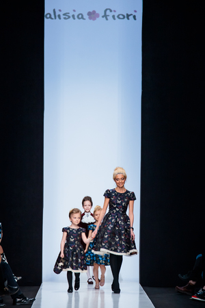 MOSCOW, RUSSIA - MARCH 15, 2017: Model walk runway for ALISIA FIORI catwalk at Fall-Winter 2017-2018 at Mercedes-Benz Fashion Week Russia. Kid's fashion. Fashion Time Designers.のeditorial素材