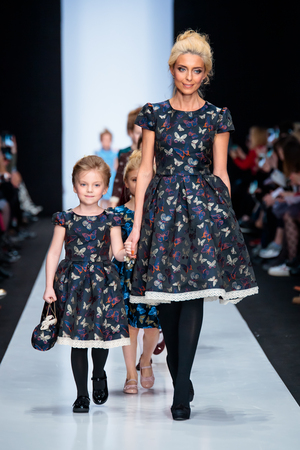 MOSCOW, RUSSIA - MARCH 15, 2017: Model walk runway for ALISIA FIORI catwalk at Fall-Winter 2017-2018 at Mercedes-Benz Fashion Week Russia. Kid's fashion. Fashion Time Designers.のeditorial素材