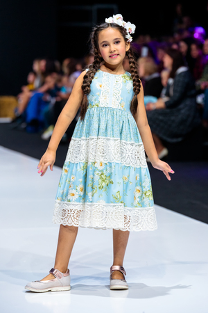 MOSCOW, RUSSIA - OCTOBER 28, 2017: Model walk runway for LANA2ROCK by ASUTINA JULIA for KIDS catwalk at Spring-Summer 2018 Season Moscow Fashion Week. Kid's fashion.のeditorial素材